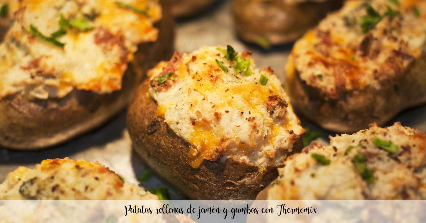 Potatoes stuffed with ham and prawns with Thermomix